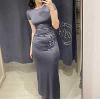 Елегантна сіра сукня