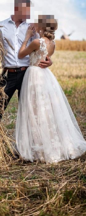 Śmietankowa suknia ślubna