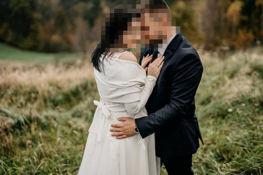 Suknia ślubna z welonem i etolą