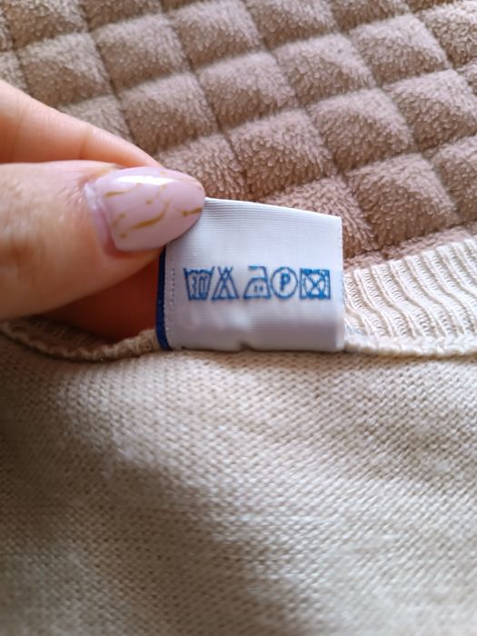 Beżowy sweter męski