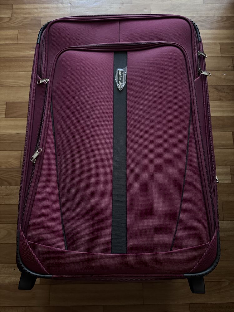 Тканинна валіза Wings Buzzard 1706 велика на 2 колесах червона