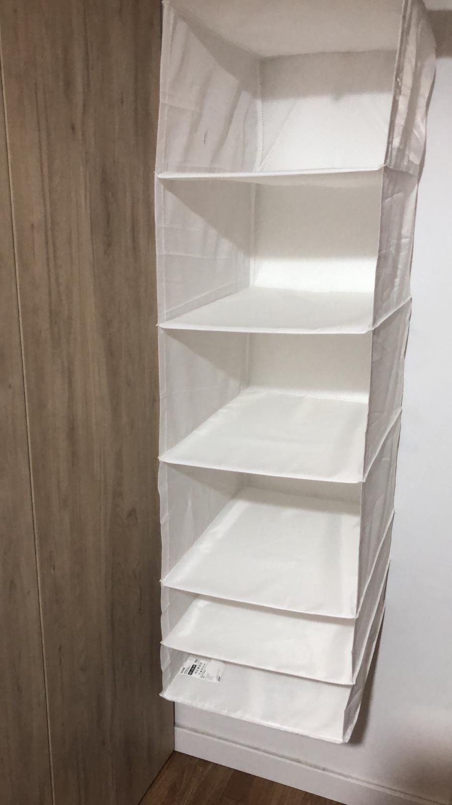 Separador de arrumacoes para armario