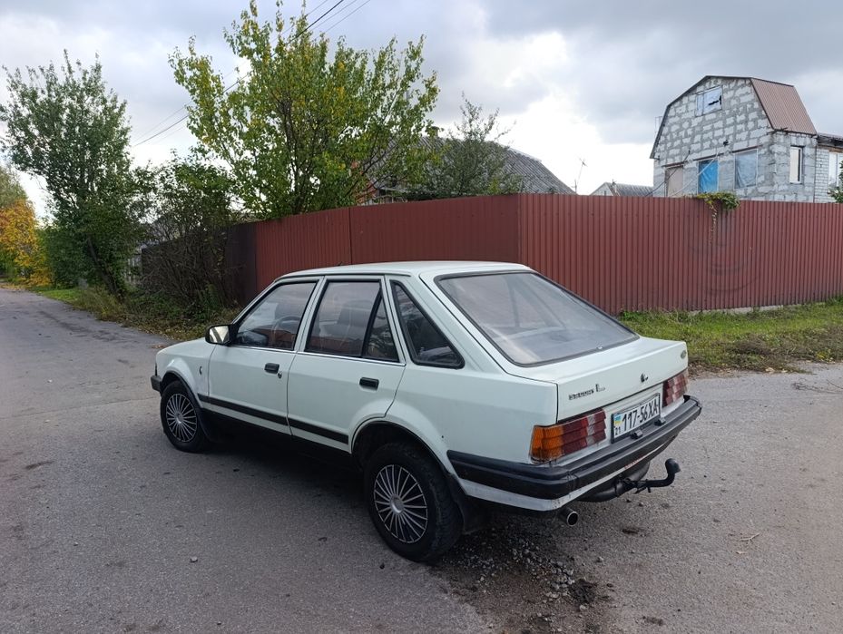 Форд эскорт газ/бензин