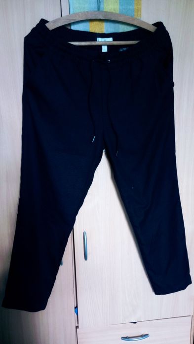 Spodnie H&M z delikatną kratę