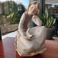 Porcelanowa figurka NAO Lladro dziewczynka z gołębiem