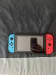 Nintendo Switch em Ótimo Estado + Bolsa de Transporte Nintendo + Jogos
