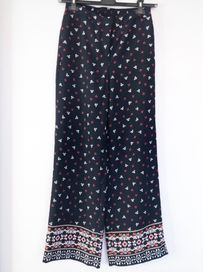 Eleganckie szerokie spodnie w kwiatki H&M