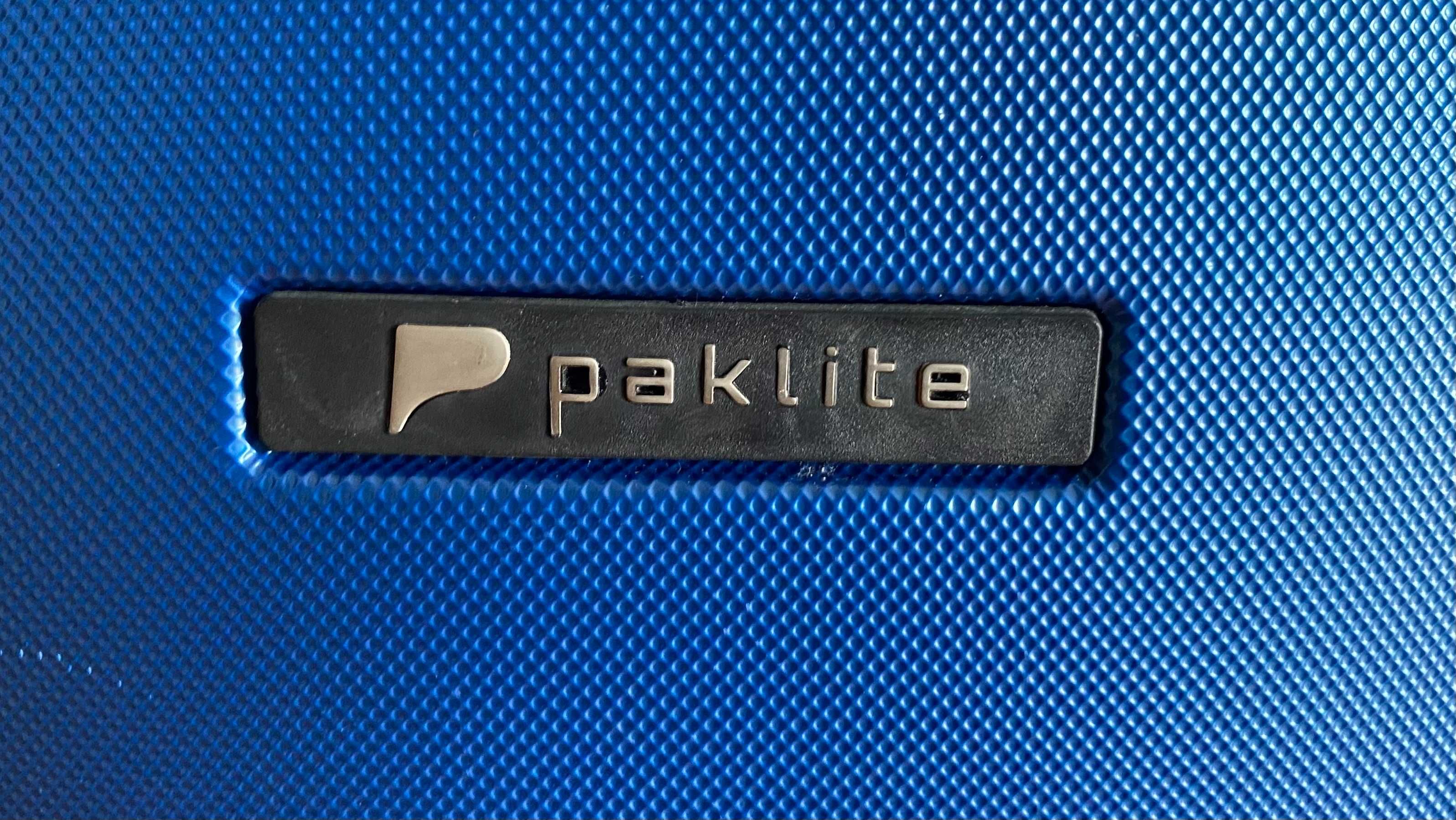 Large blue Paklite travel luggage