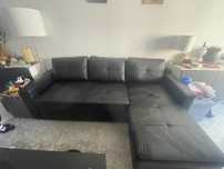 Sofa com chaisse long com arrumacao