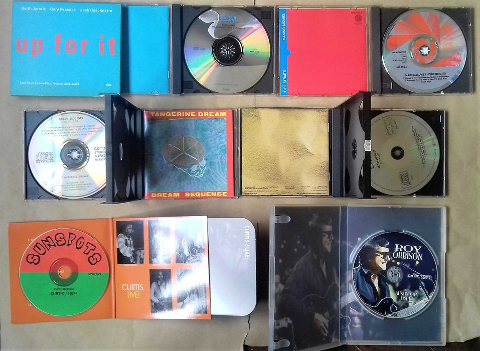 Cd de Curtis Mayfield e 1 DVD do Roy Orbinson.