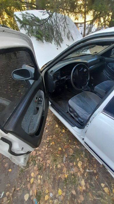 Кіа Кларус 2000 рік 2.0 газ/бензин ціна за двигун частинами