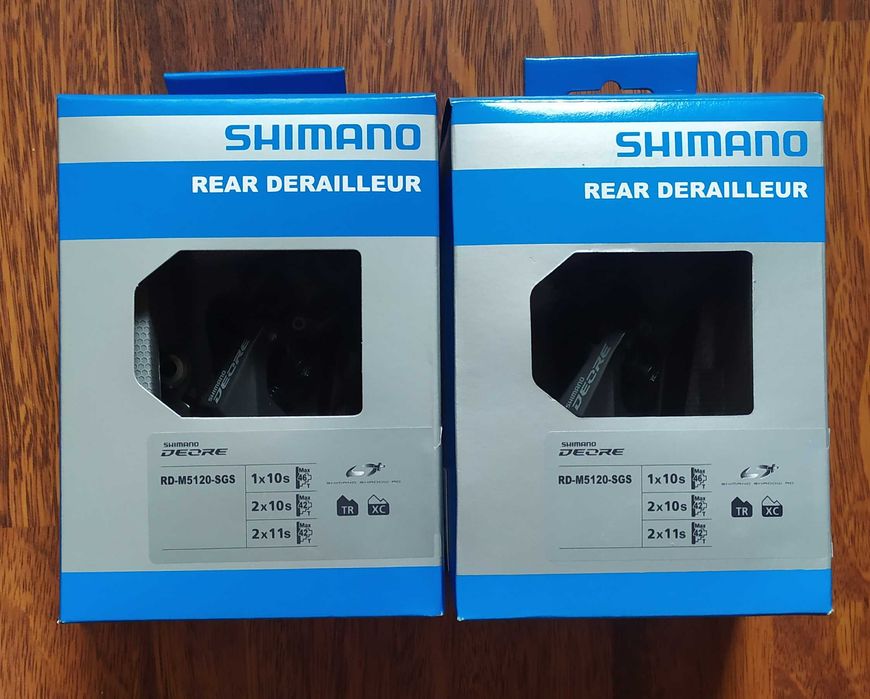 Задній перемикач Shimano Deore; SLX;(ХТ) 7--12 швидкостей
