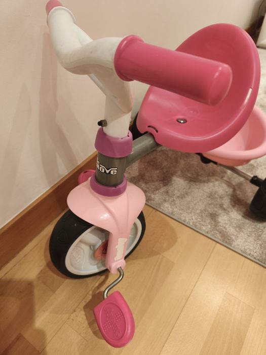 Triciclo em tons de rosa