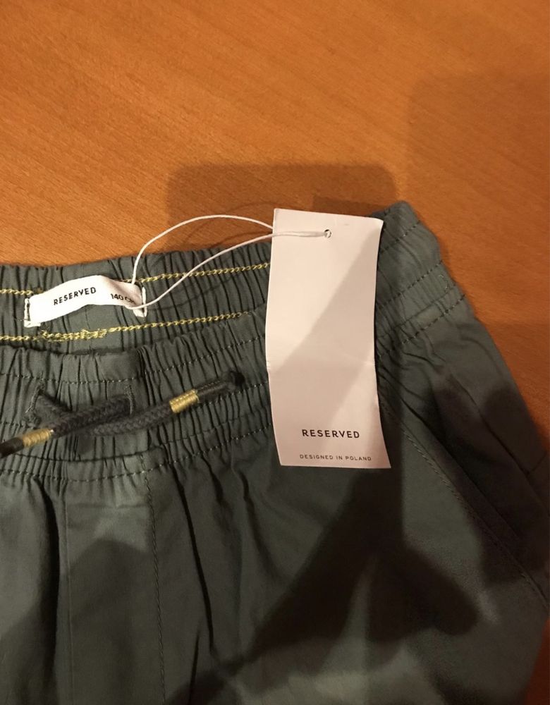 Spodnie chłopięce z kieszeniami Reserved 10 lat 146 cm