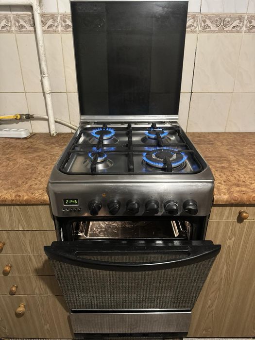Газова та електро плита з духовкою, робоча Hotpoint Ariston