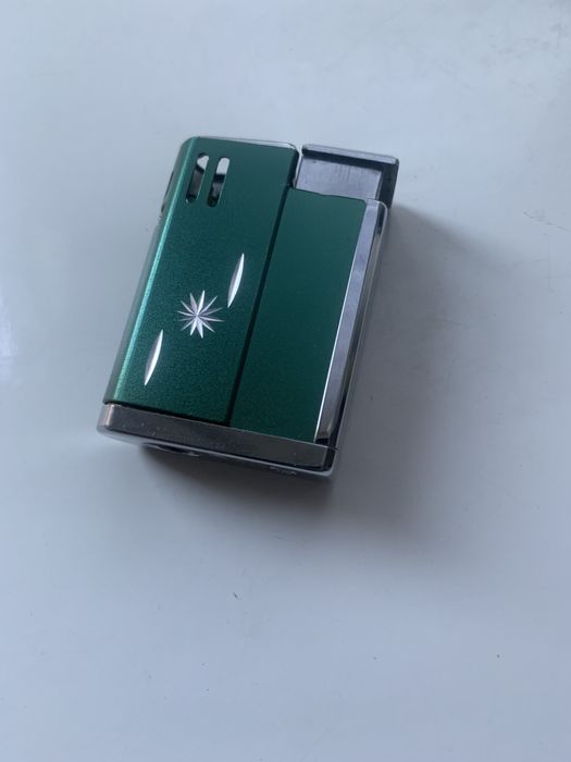 Продам зажигалку
