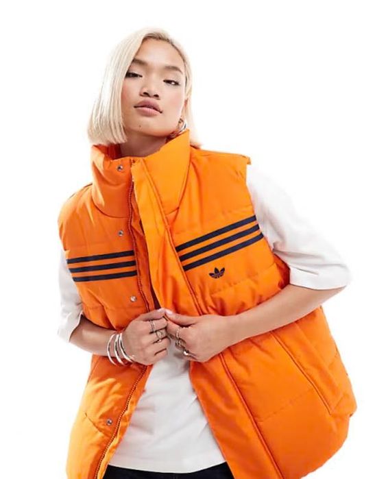 Зимова тепла жилетка adidas оригінал нова з біркою ,розмір Л . Унісекс