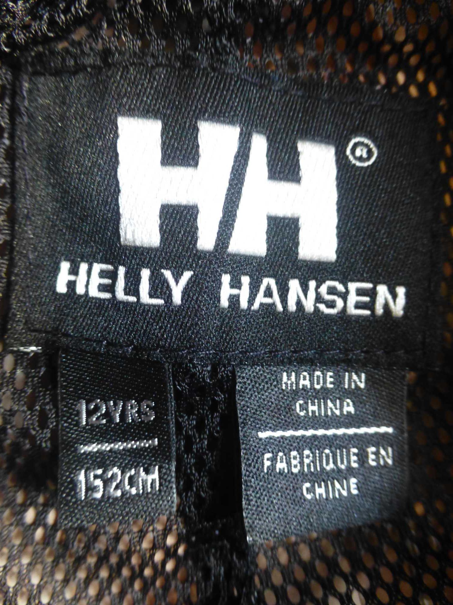 Nowe spodnie przeciwdeszczowe trekkingowe Helly Hansen 152 cm