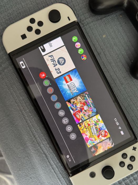 Nintendo switch oled + jogos + acessorios