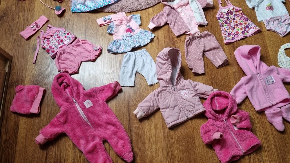Wózek, lalka typu baby born, wanienka, zestaw ubranek i akcesoria