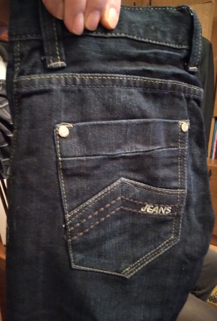 Spodnie jeansowe roz W-18  nowe