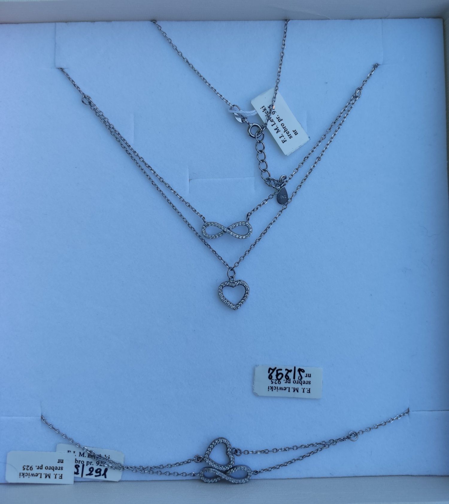 Komplet srebrnej biżuterii łańcuszek i bransoletka z charmsami