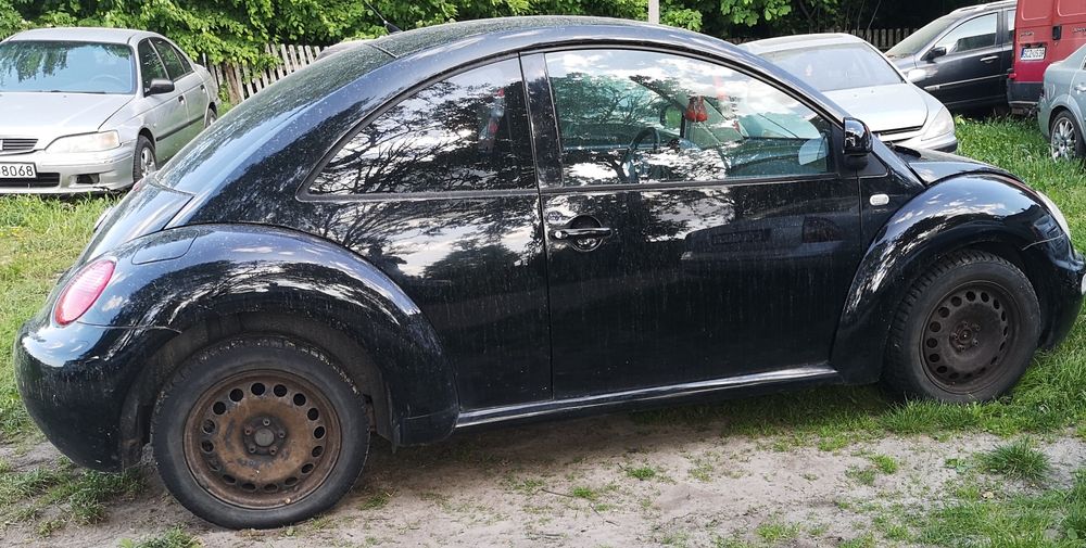 VW New Beetle części od a-z mocowanie okular lampy prawy przód  orygin