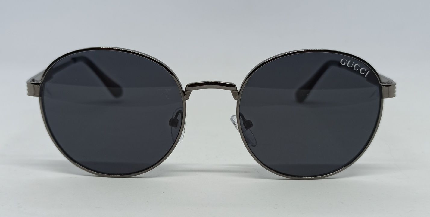 Gucci очки унисекс черные однотонные в сером металле округлые