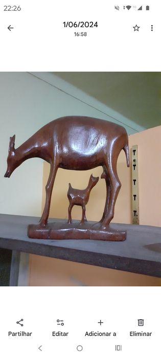 Estatueta Africana e quando bordado á mão com vidro