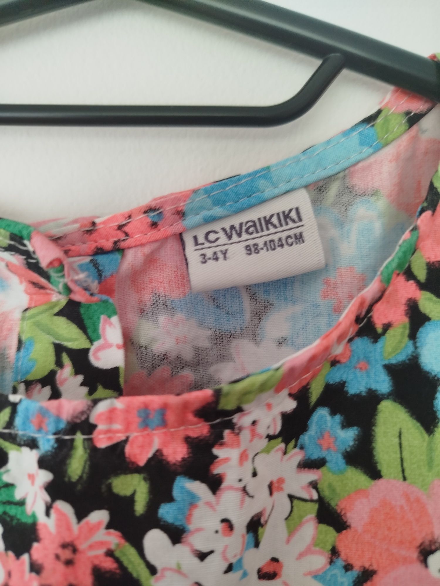 Dziewczęca sukienka rozmiar 98-104
#