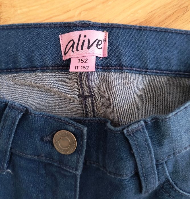 Spodnie jeansowe na dziewczynke 152 nowe