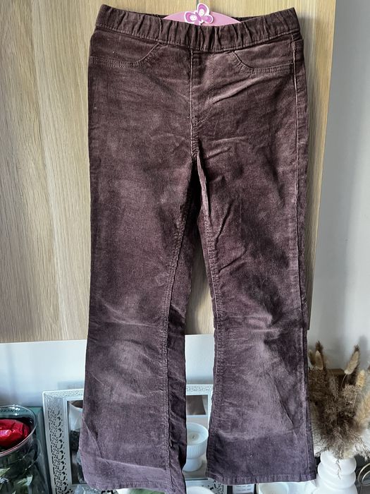 Brązowe sztruksowe spodnie FLARE H&M roz. 128