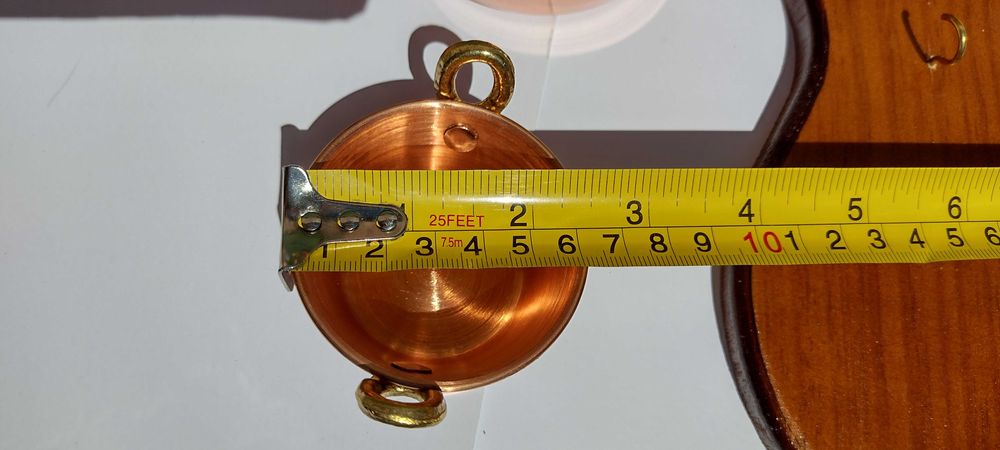 Conjunto de panelas com suporte