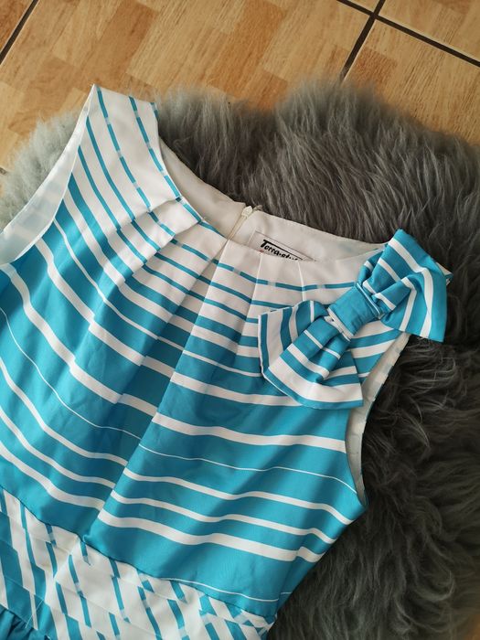 Sukienka elegancka piękna błękitna na wesele w paski z kokardą m 38