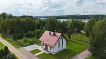 Nowy dom nad jeziorem Szelment z prywatną plażą