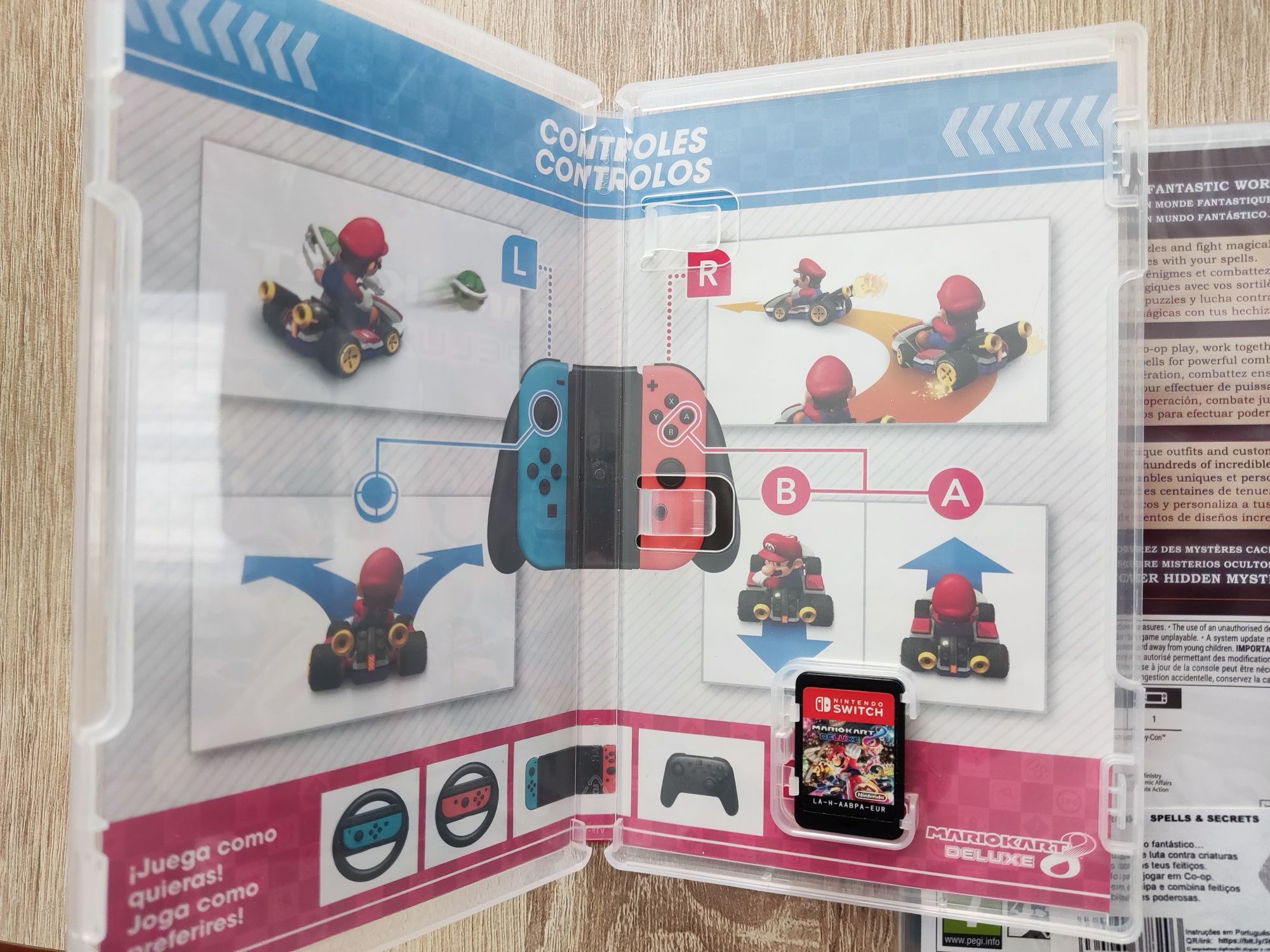 2 jogos nintendo switch Mario kart 8 e Spells and Secrets