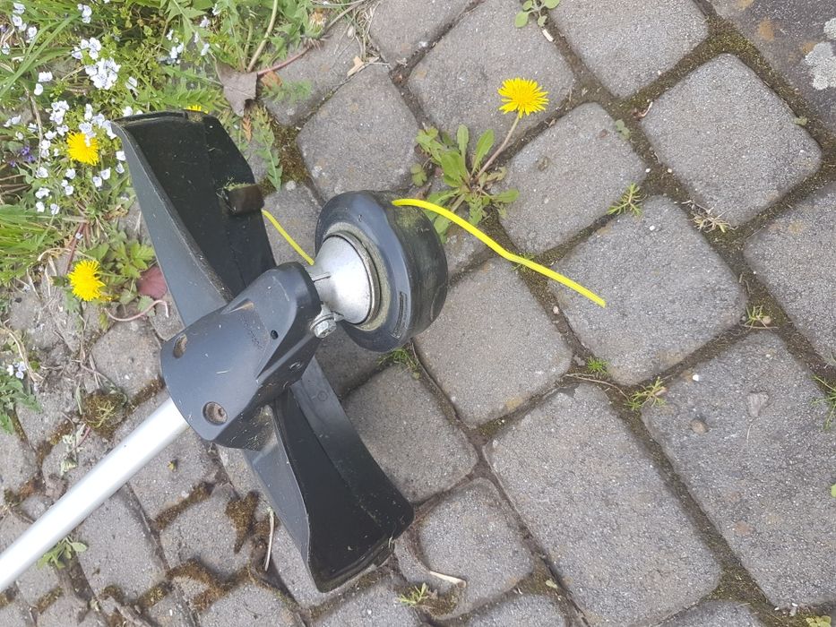 Бензокоса  Dolmar ,  4-х так-на.