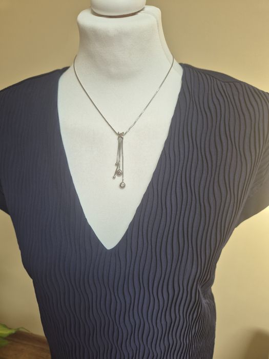 Elegancka klasyczna sukienka dopasowana Reserved  dekoldV granat 36