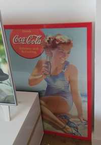 Duży plakat za szkłem Coca Cola