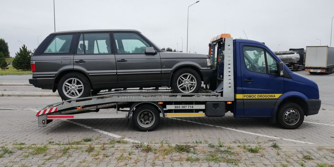 Przewóz Pojazdów Maszyn Autolaweta Laweta Pomoc Drogowa Polska UE