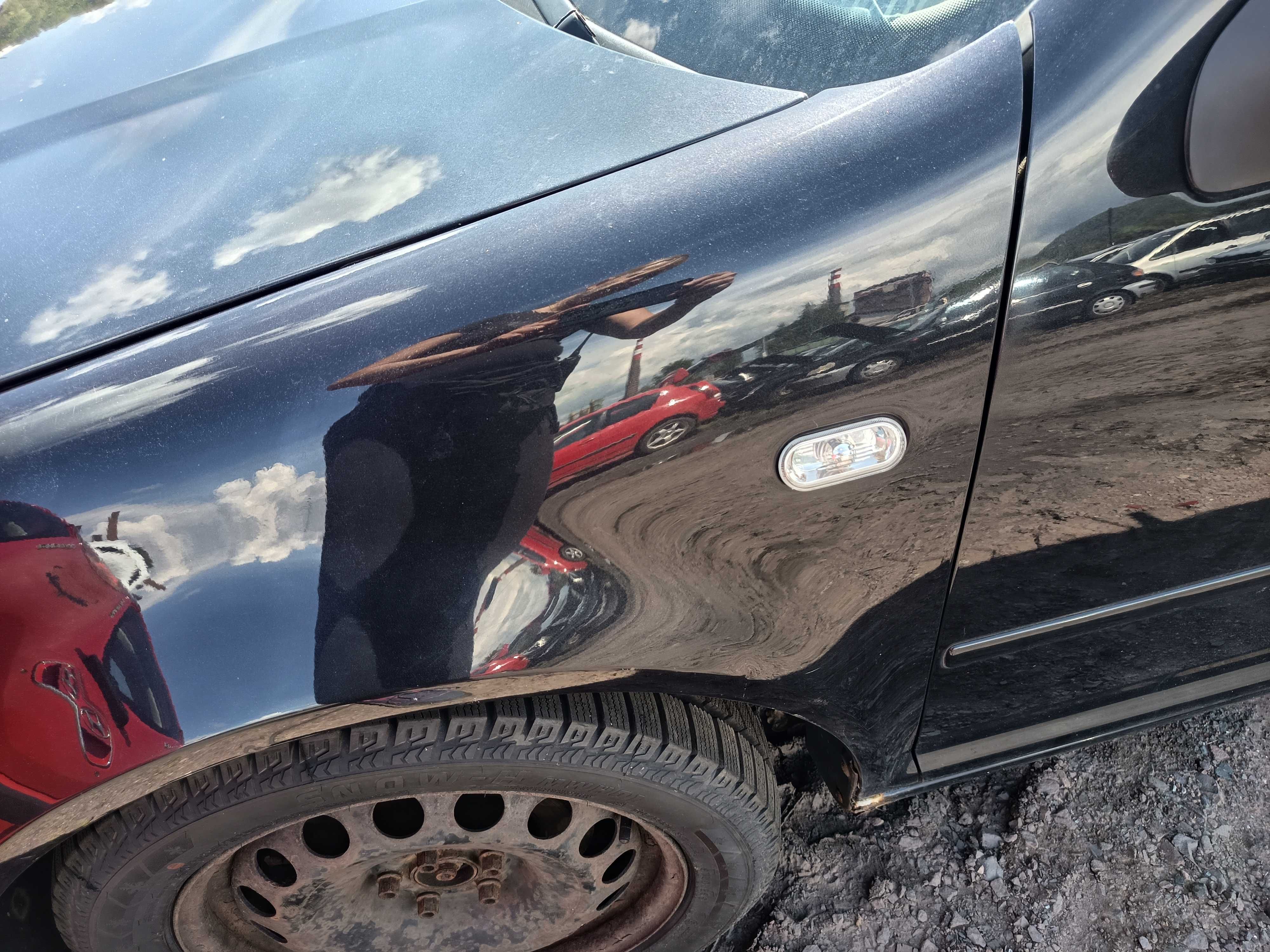 VW Bora błotnik przedni lewy czarny FV transport/dostawa