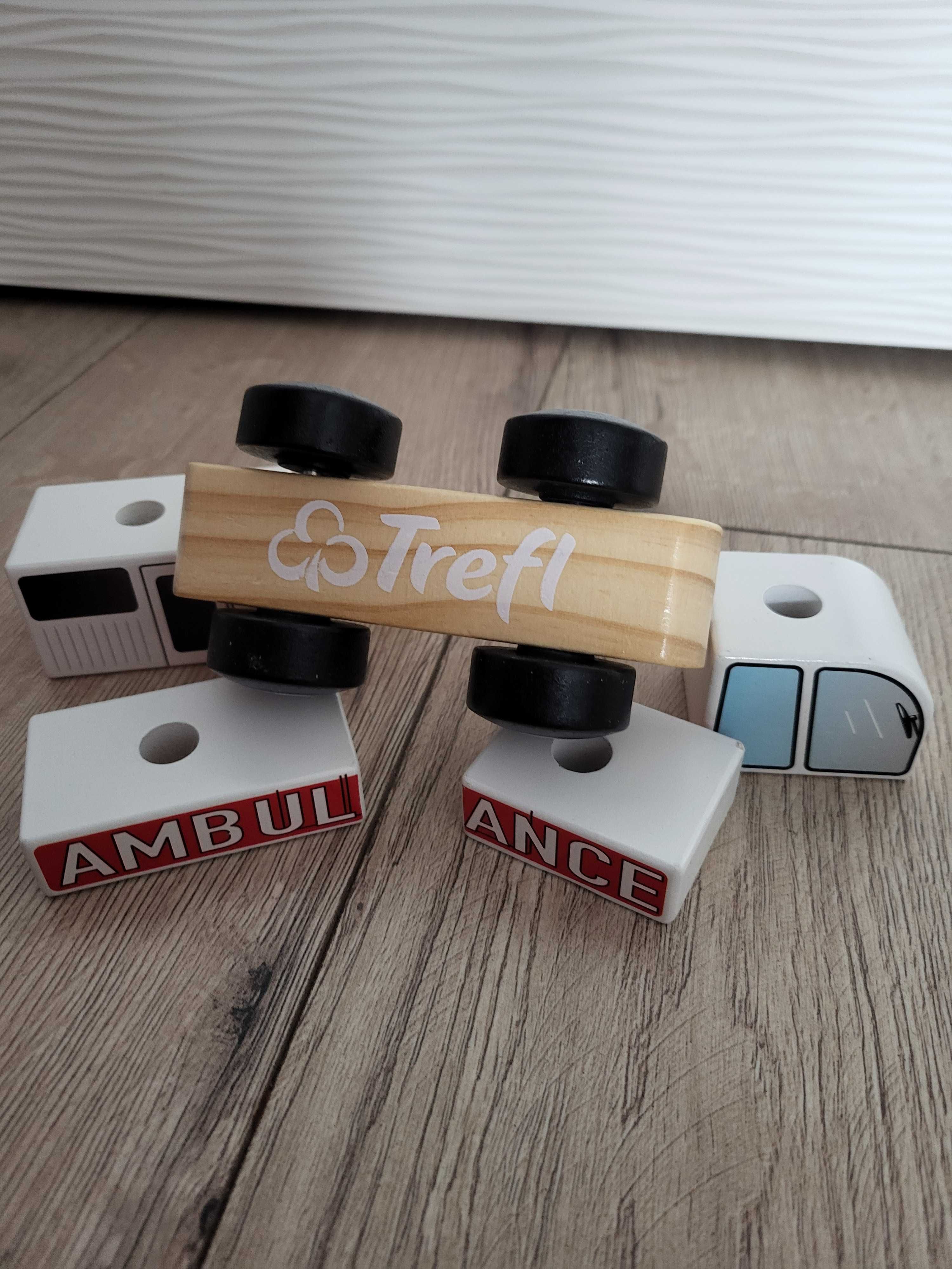 Drewniany ambulans Trefl, zabawka karetka, pojazd, autko