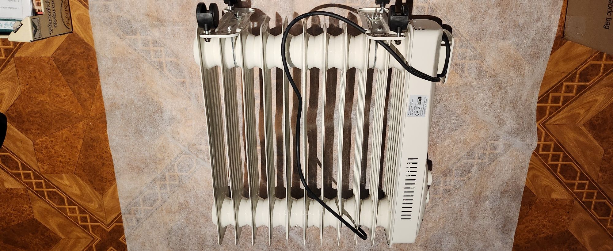 Grzejnik olejowy energooszczędny termostat Kiano 2500W 11 żeber