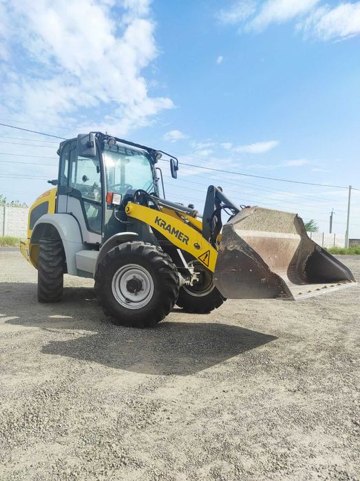 Фронтальний навантажувач KRAMER 5055. Корисний всі чотири сезони.