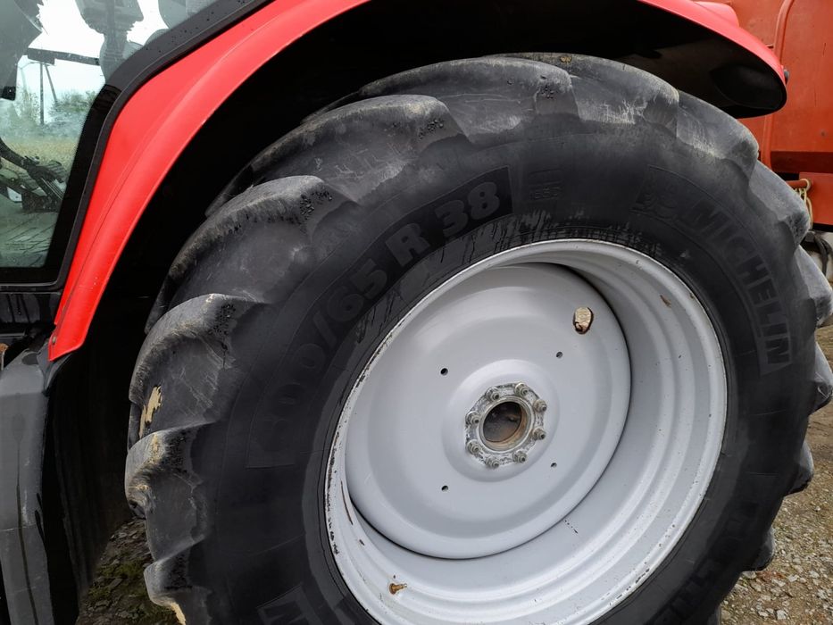 Massey Ferguson 6465 z ladowaczem renault Claas Ares Fendt