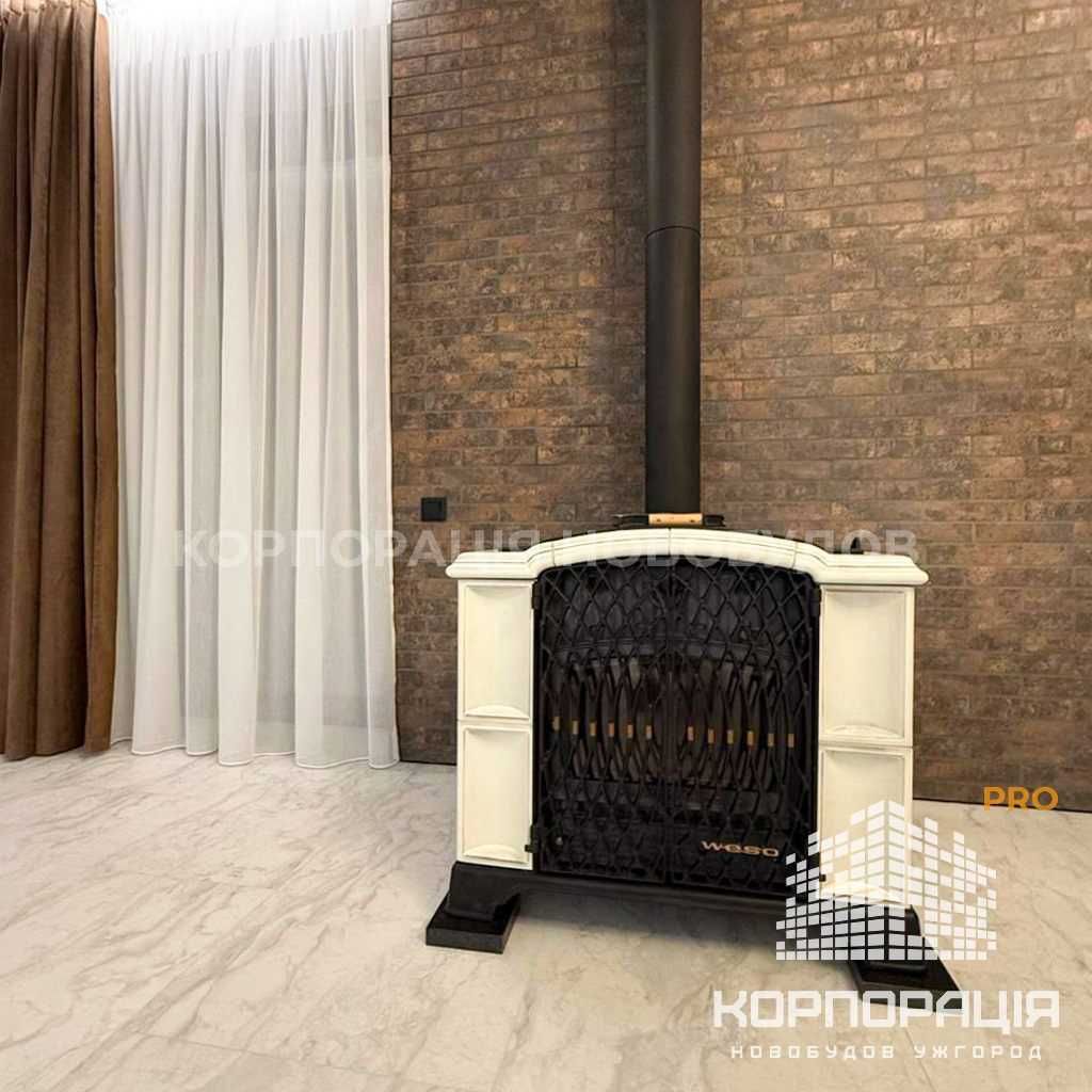 Продаж котеджу з дизайнерським ремонтом, меблями, технікою, каміном
