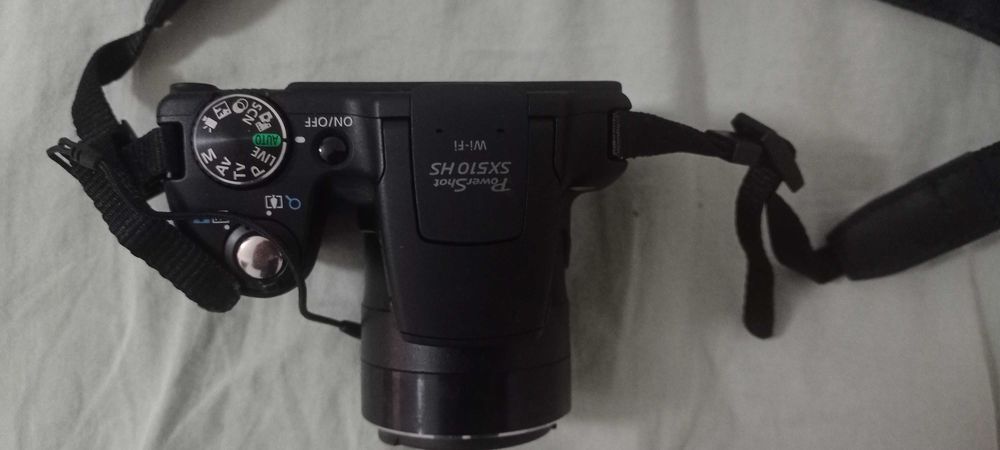 Vendo a excelente preço Máquina fotográfica Canon SX510HS.
