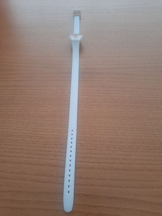 Relogio como novo de mulher marca  swatch.