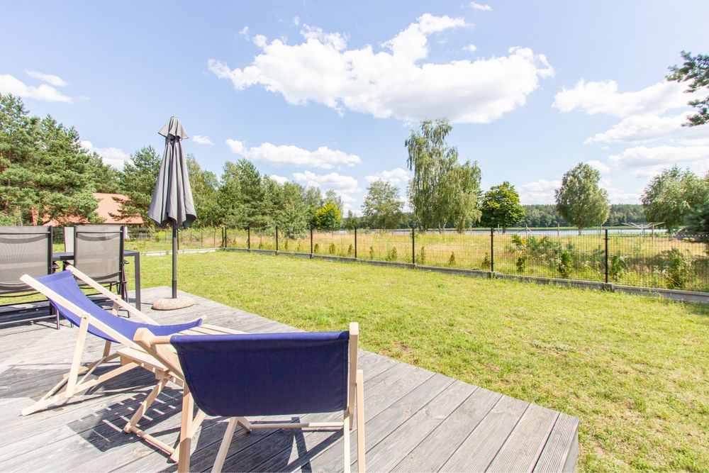 Domek letniskowy z widokiem na jezioro Spore