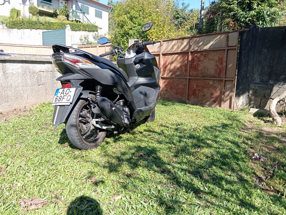 Sym jet x 125. Aquecimento a punhos